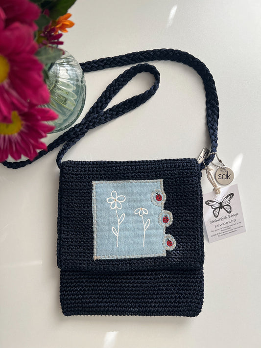 Reworked hand-painted flowers and ladybugs appliqué The Sack bag